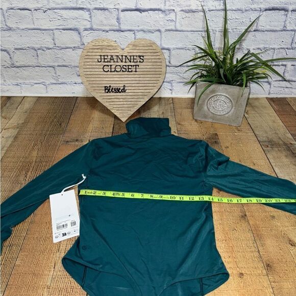 Lululemon Wundermost Ultra-Soft Nulu Turtleneck Bodysuit
Storm Teal - Picture 13 of 15